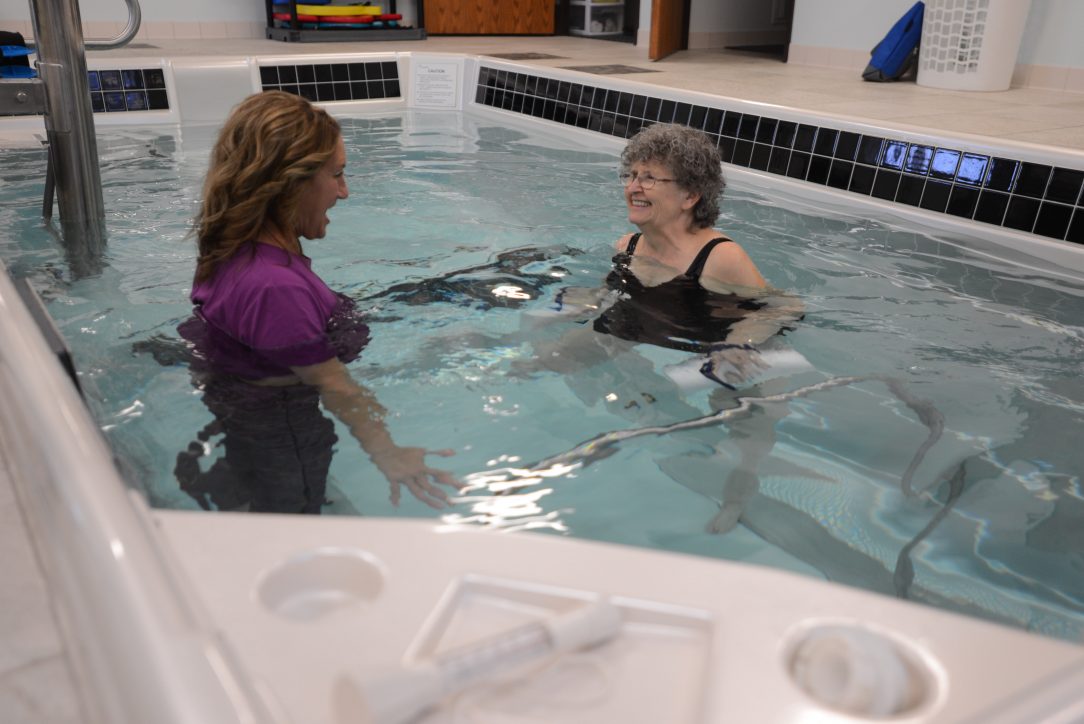 Patient and therapist in Paramount pool